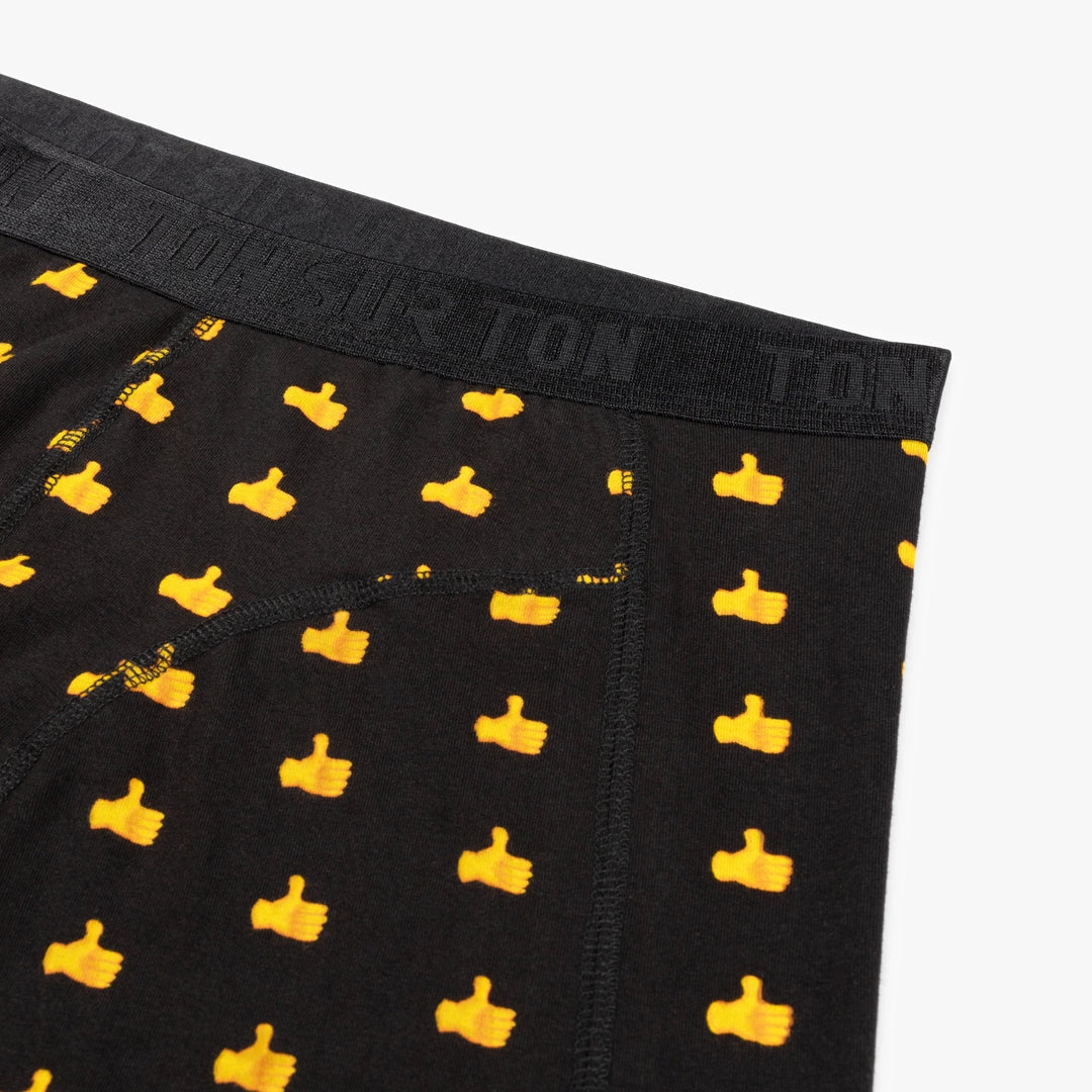 Detailansicht der Herren-Boxershorts mit Daumenhoch Motiv
