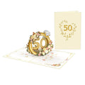 Geöffnete Pop-Up Karte zum 50. Hochzeitstag mit goldenem 3D-Ring und floralem Cover