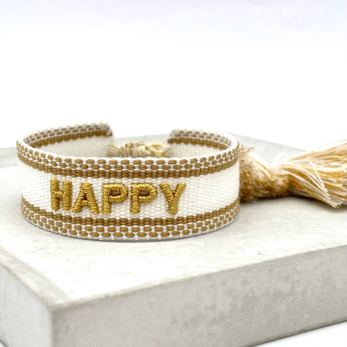 HAPPY Statement-Armband in Beige und Gold mit Quaste