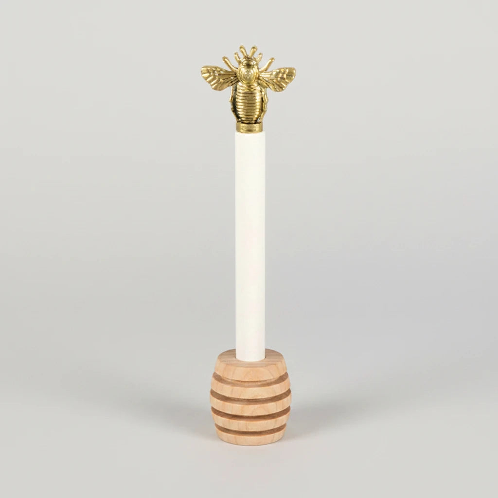 Honiglöffel aus Holz mit goldfarbener Biene

