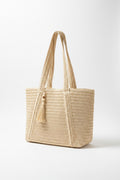 Grosser Shopper in hellem Beige aus geflochtenem Stroh mit lila Streifen und braunen Ledergriffen – Aussenansicht - el encanto