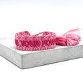 Armband FEEL YOUR POWER Statement – gewebt & bestrickt